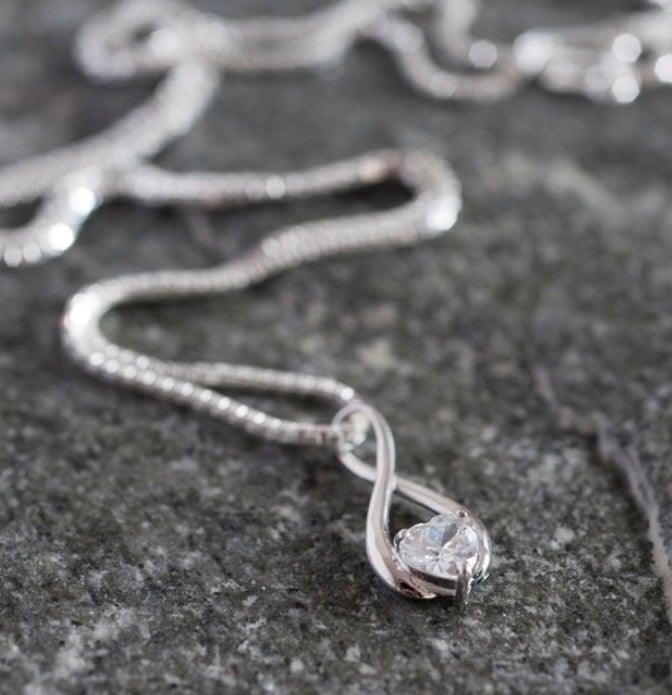 infinity necklace made of pure 9ct white gold and on a white gold trace chain. infinity symbol features a heart Cubic zirconia heart Infinity, Necklace, White Gold, Heart, Cubic Zirconia, Valentine’s, Bridesmaid, Bride, Gift, Jewellery Gift, Necklace Gift, Birthday Gift, Friendship, Love, Pendant, Heart, Heart Pendant, 