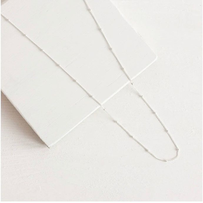 minimalist understated designed sterling silver chain with delicate silver ball detailing.